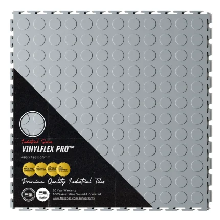 Top view of Flexspec VinylFlex Pro Coin commercial-grade PVC garage floor tile in Steel Grey with retail packaging sleeve highlighting its heavy-duty industrial strength.