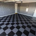 A classic grey and black checkerboard garage floor installed using Flexspec DiamondFlex Pro solid interlocking tiles.